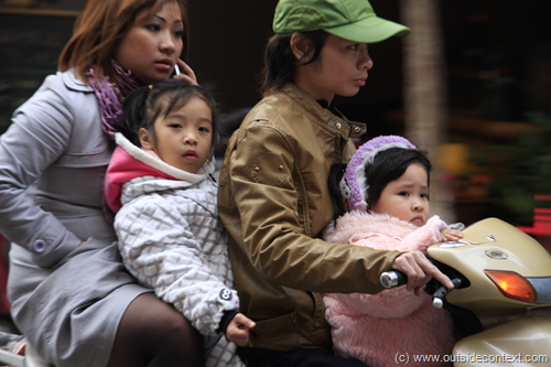 Four people, but one moped Four people, but one moped